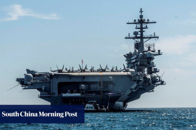 US aircraft carrier steams from South China Sea to Mideast after Trump threat against Iran