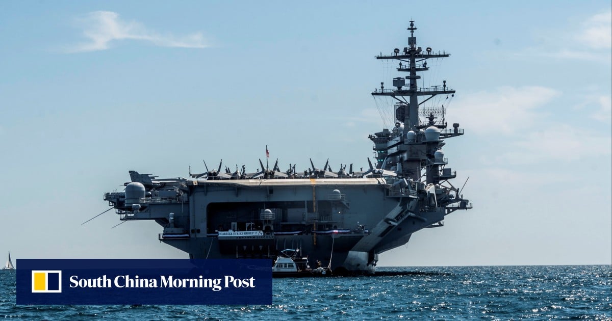 US aircraft carrier steams from South China Sea to Mideast after Trump threat against Iran