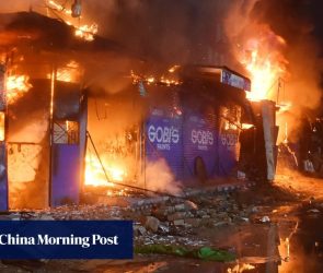 11 dead, over 60 missing after Pakistan shopping centre fire smoulders for 24 hours