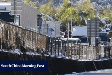 Japan snowstorm traps 3,000 vehicles in 23km traffic jam on highway over New Year