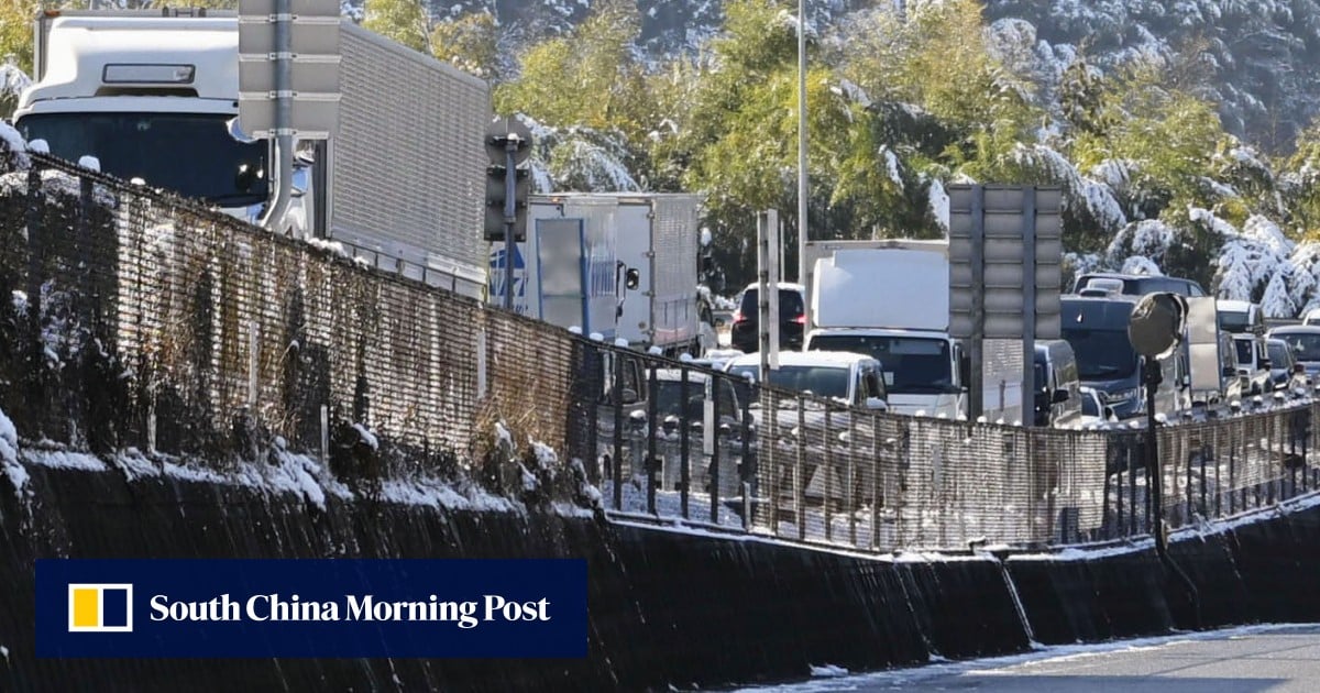 Japan snowstorm traps 3,000 vehicles in 23km traffic jam on highway over New Year