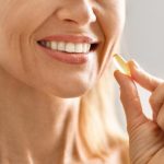 Beauty Supplements. Closeup Smiling Woman