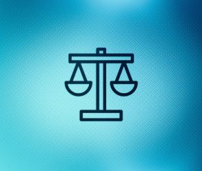 Close up of justice scales icon on screen