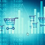 Multiple shopping carts over a data background to illustrate customer data.