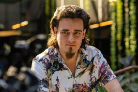 Palmer Luckey, founder of Anduril Industries, during an interview on "The Circuit with Emily Chang" at Anduril's headquarters in Costa Mesa, California, US, on Thursday, Dec. 14, 2023. Anduril recently beat several legacy defense players in a contest for a major contract to develop an unmanned fighter jet for the US Air Force and is now valued at $8.5 billion. Photographer: Kyle Grillot/Bloomberg via Getty Images