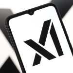 The xAI logo displayed on a smartphone screen.