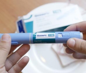 Holding Semaglutide Ozempic Injector Pen in Hands