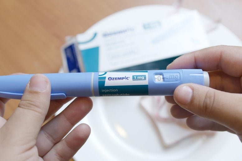 Holding Semaglutide Ozempic Injector Pen in Hands