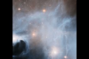 Hubble spots three young stars going through growth spurts