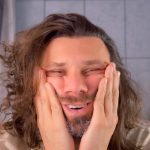 Tired Exhausted Delirious Long Haired Man Touching Face