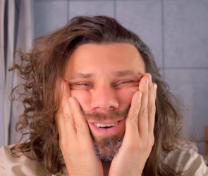 Tired Exhausted Delirious Long Haired Man Touching Face