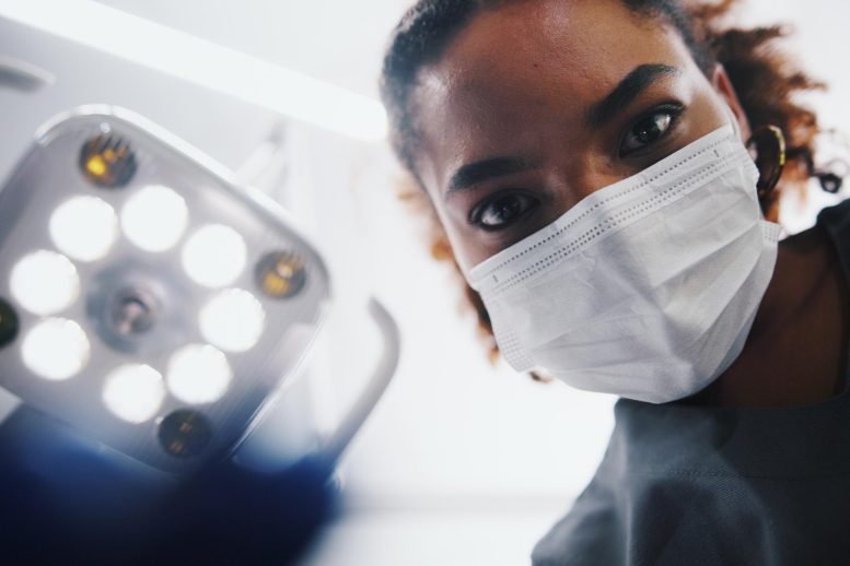 Woman Dentist Oral Surgery