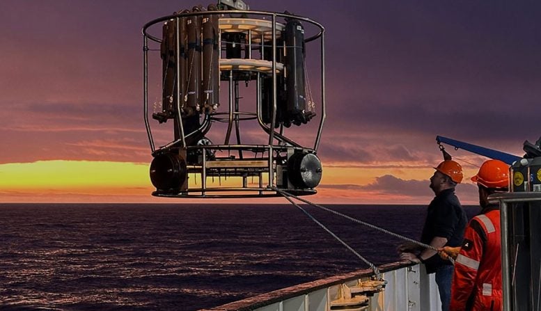 Workers on the RRS Discovery Lower a Sensing Instrument Into the Southern Atlantic Ocean