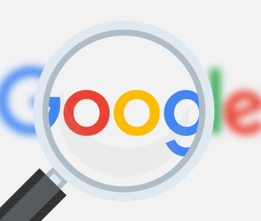 Magnifying glass over Google logo