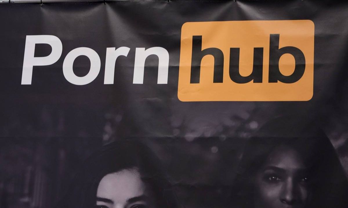 A sign hangs at the Pornhub booth at the 2023 AVN Adult Entertainment Expo at Resorts World Las Vegas on January 06, 2023 in Las Vegas, Nevada.