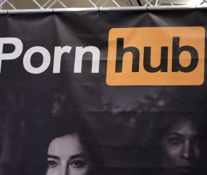 A sign hangs at the Pornhub booth at the 2023 AVN Adult Entertainment Expo at Resorts World Las Vegas on January 06, 2023 in Las Vegas, Nevada.