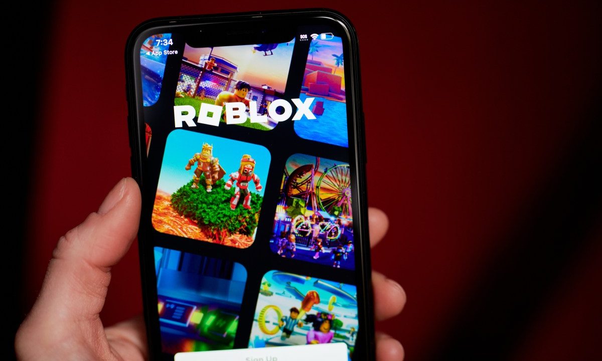 The Roblox app displayed on a smartphone