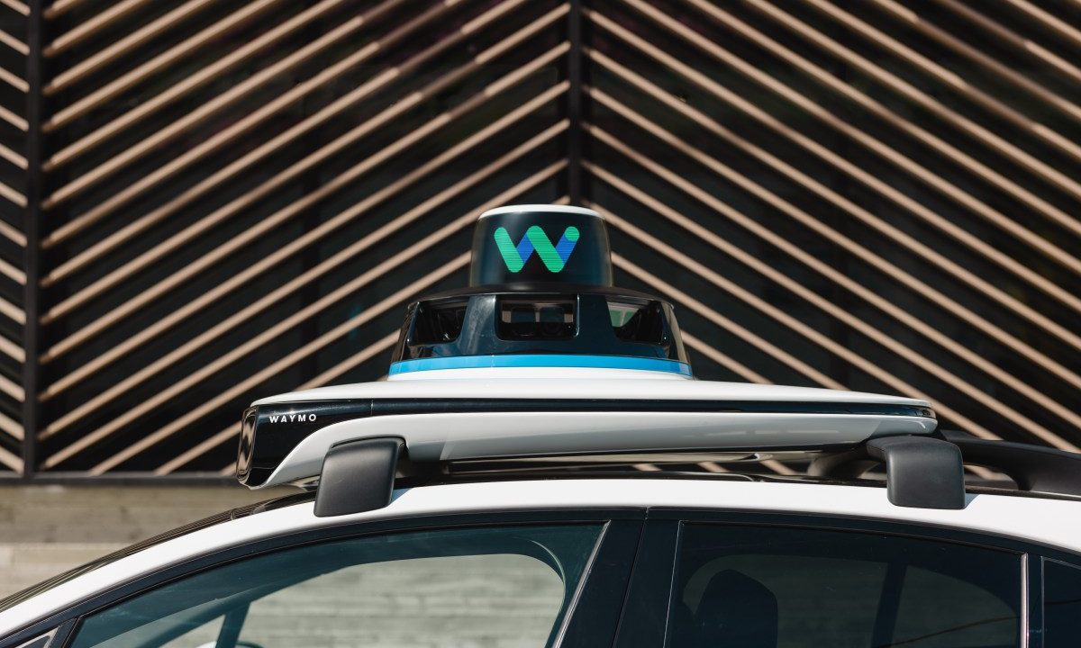 top of Waymo car, showing equipment on roof