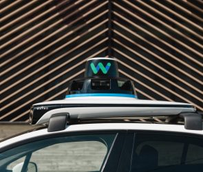 top of Waymo car, showing equipment on roof