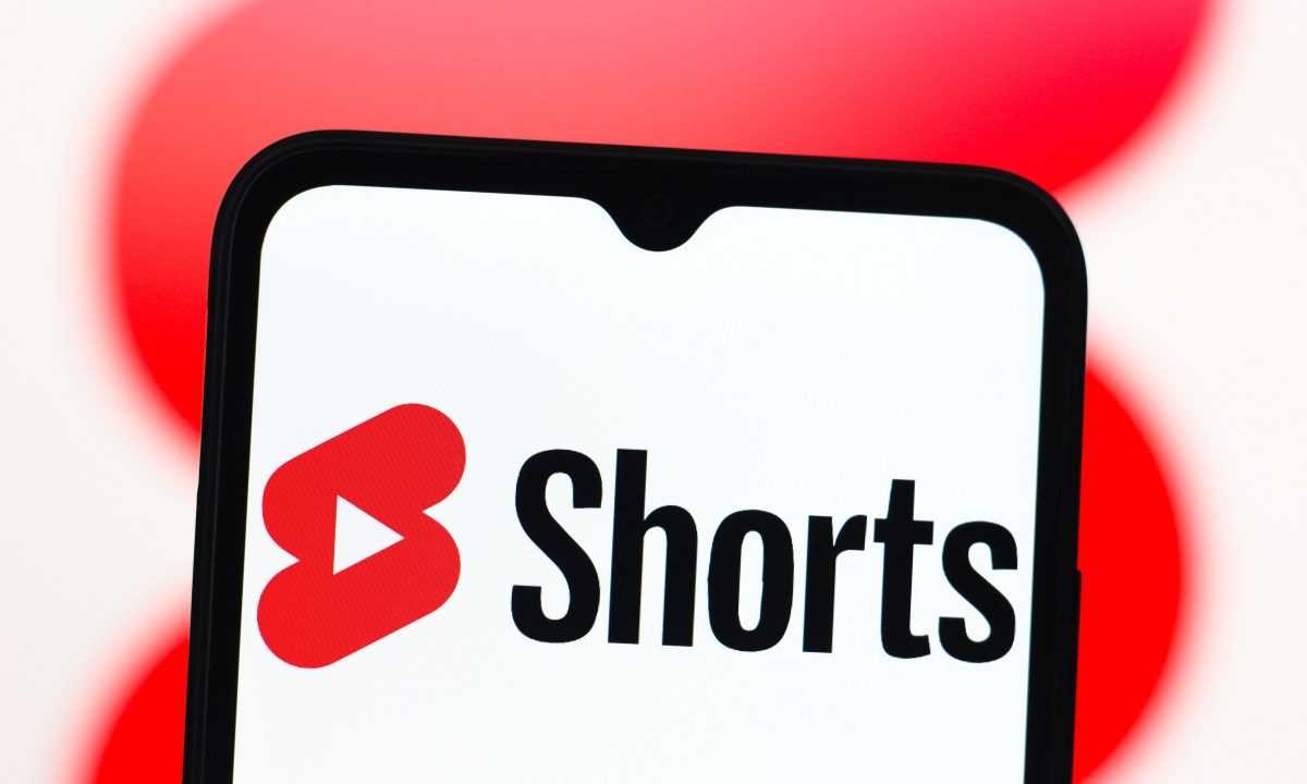 In this photo illustration, the YouTube Shorts logo is seen displayed on a smartphone screen.