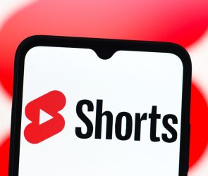 In this photo illustration, the YouTube Shorts logo is seen displayed on a smartphone screen.