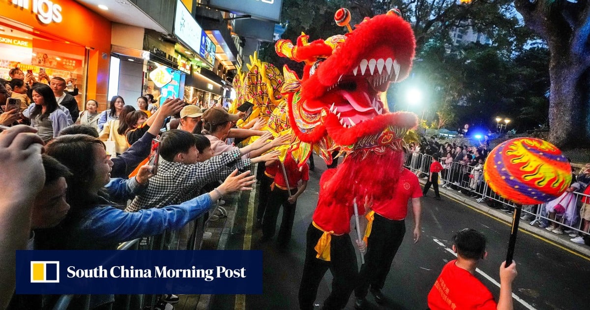 Excited spectators pack streets for Hong Kong Lunar New Year night parade