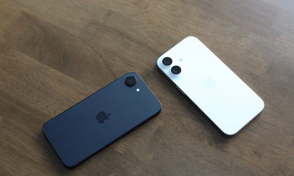 Two Apple iPhone 16e units splayed on table
