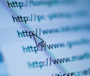 Cursor arrow pointing at URL on screen