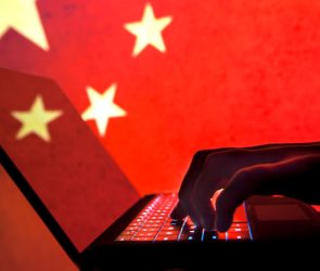 Cybercriminal, hacker China flag background.