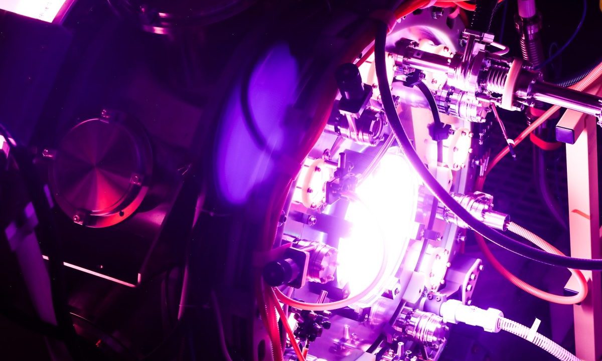 A fusion reactor glows purple.