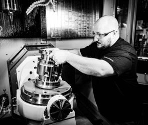 A man assembles a fusion device.