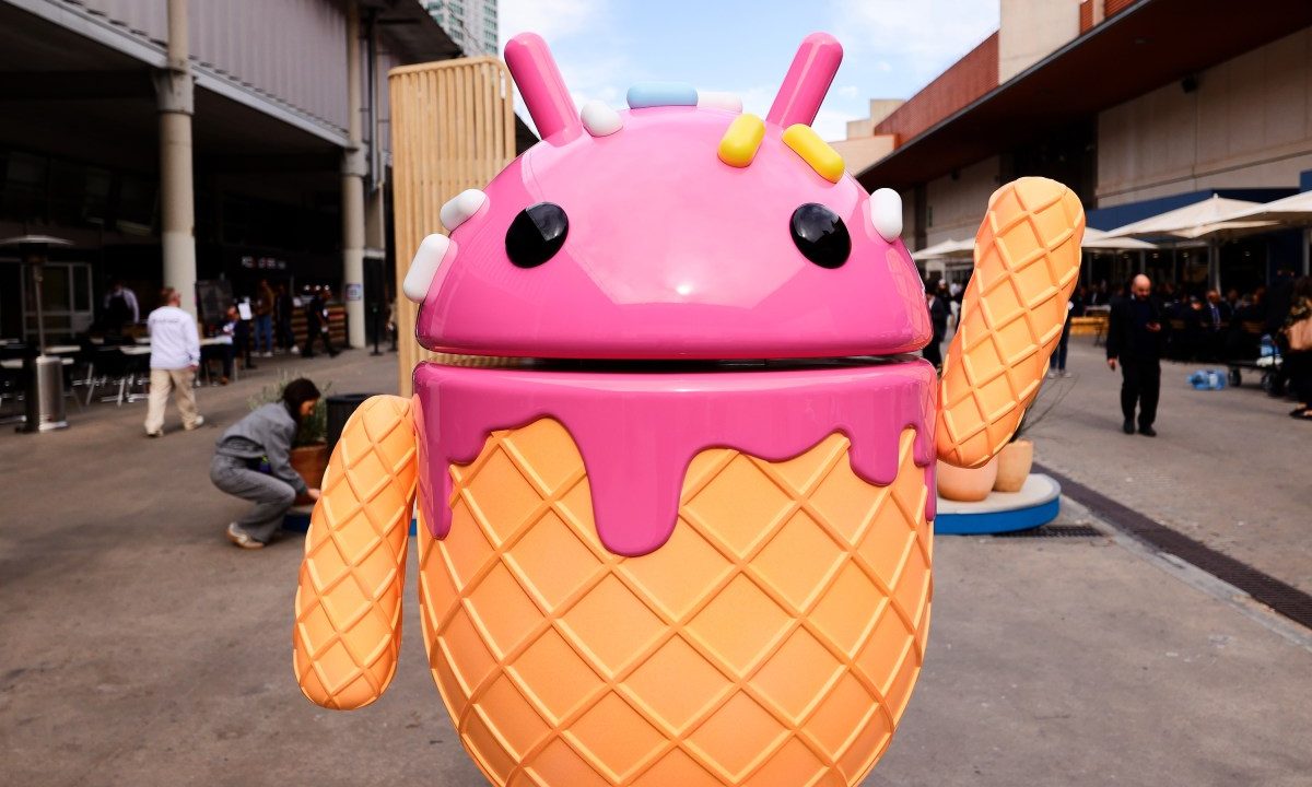 The Google Android logo and mascot, known as Bugdroid by the community, is being displayed as a statue resembling a strawberry ice-cream cone on Android Avenue at the Mobile World Congress 2024 in Barcelona, Spain, on March 25, 2024.
