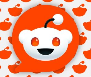 large Reddit logo overlaying background of smaller logo silhouettes
