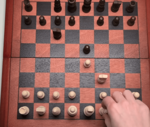 Homemade chess board moves its own pieces. And wins.
