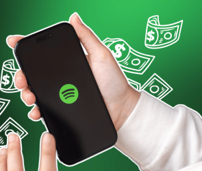 Spotify logo on mobile phone with cartoony dollar bills floating in background