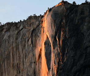 Yosemite's glowing, golden waterfall is flowing again