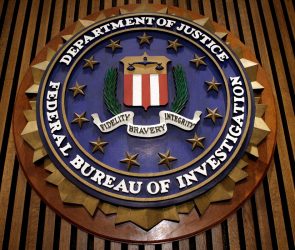 The seal of the F.B.I. hangs in the Flag Room at the bureau's headquaters March 9, 2007 in Washington, DC.