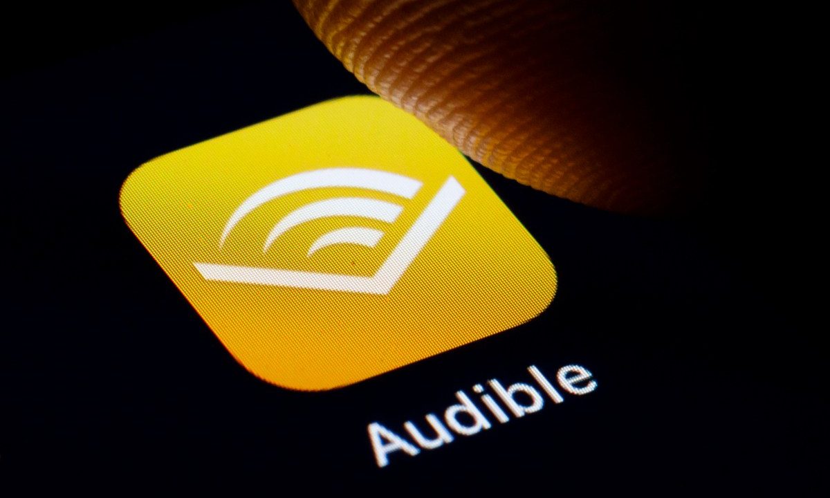 In this photo illustration the logo of Amazon Audible is displayed on a smartphone