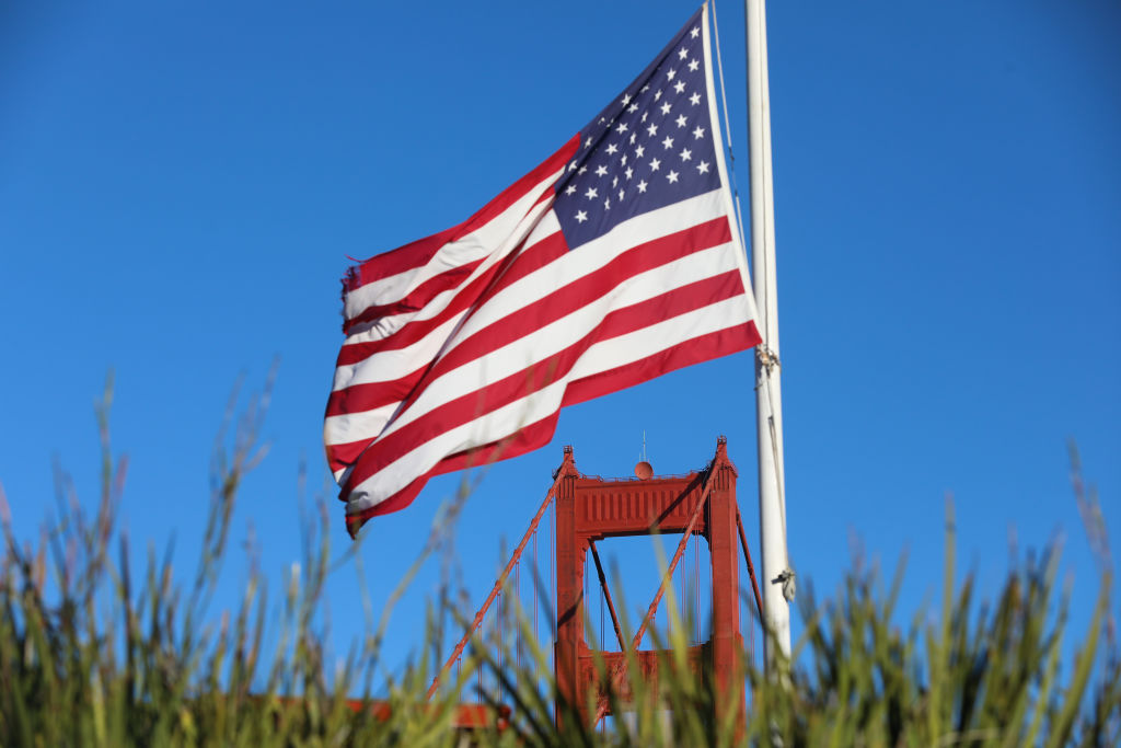 An American flag near the Golden Gate Bridge in San Francisco, California.