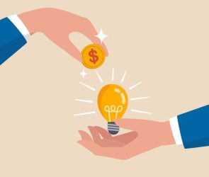 Crowd funding, new business or start up company to get money or venture capital to support or sponsor business concept, businessman hand giving money dollar coin to new business idea light bulb.