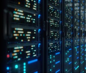 Modern data center with servers with lights on them.