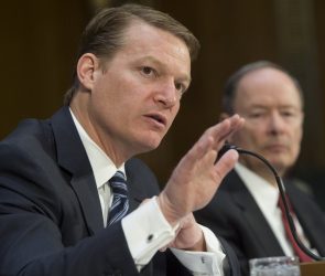 FireEye's chief executive testifying in Congress next to the former NSA director.