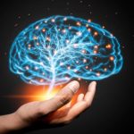 Hand Holding Glowing Brain