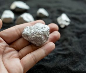 Hand Holding Silver Aluminum Platinum Metal