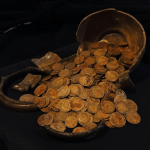 A buried jar of imperial gold coins resurfaces in Russia