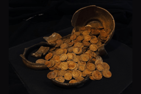 A buried jar of imperial gold coins resurfaces in Russia