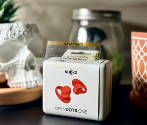 The SHOKZ OpenDots ONE clip-on earbuds are a high-energy reset in red