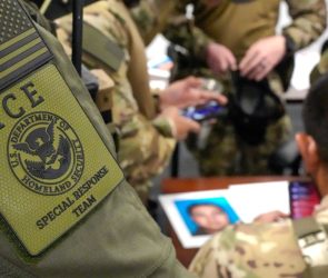 A group of U.S. Immigration and Customs Enforcement (ICE) agents.