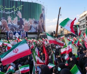 Demonstrators wave Iranian national flags as they gather for a rally in support of the new Supreme Leader at Enghelab Square in central Tehran on March 9, 2026. Iran marked the appointment of Ayatollah Mojtaba Khamenei to replace his father as Supreme Leader after Ayatollah Ali Khamenei was killed in joint U.S. and Israeli strikes on February 28.